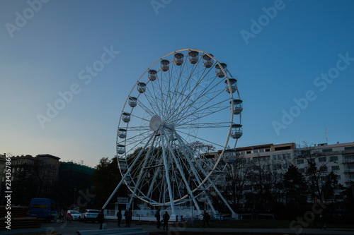Biggest Ferris wheel in Brno, Czech Republic in Moravske square during set up for Christmas event captured at night time © Lukas