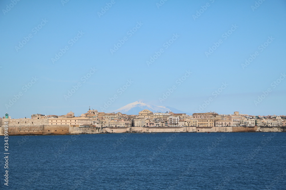 View to Syracuse and volcano Etna from the Mediterranean Sea, Sicily Italy