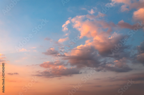 Red clouds sunset with the sky in background. © velishchuk