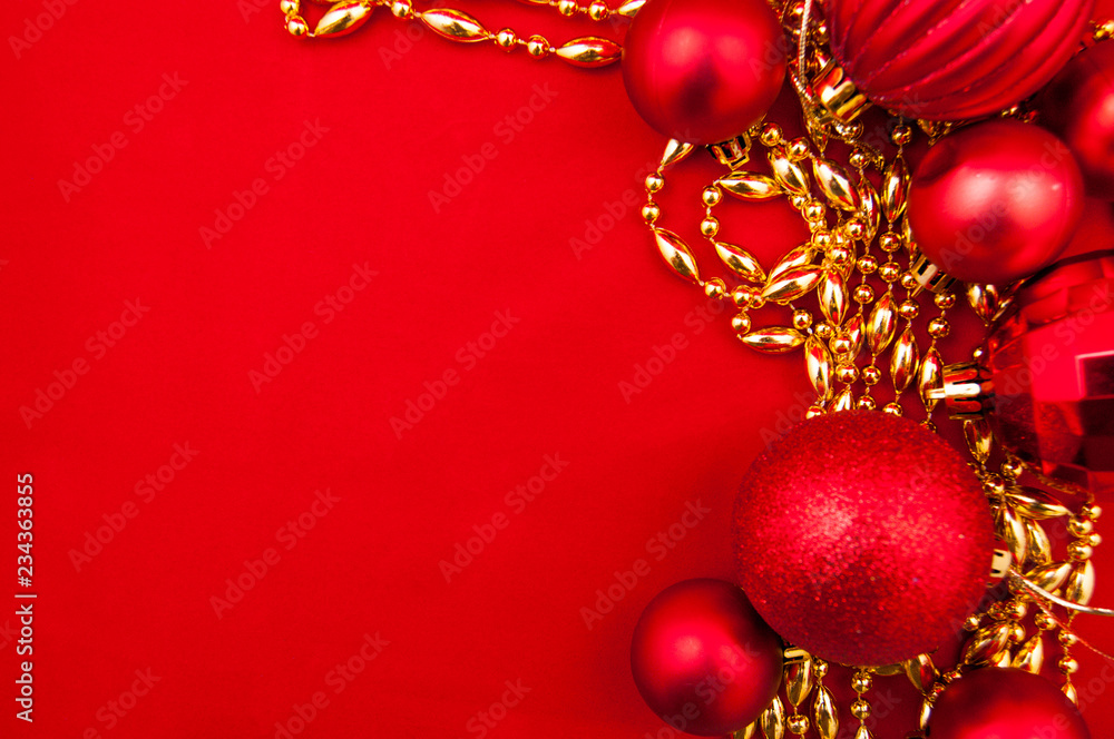 christmas decoration toys on red background with space for text christmas decoration toys on red background with space for text