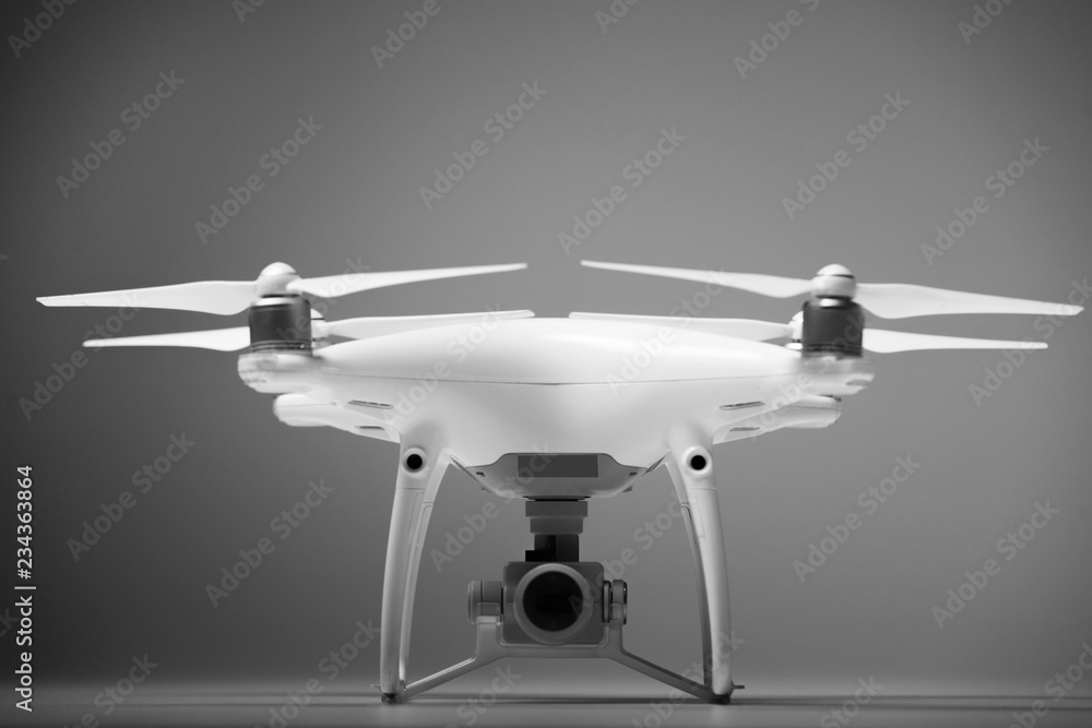 Flying drones on black background. Theme selling and buying drone Stock  Photo | Adobe Stock
