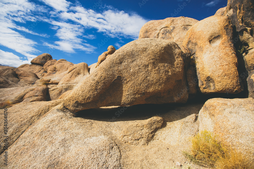 View of Alabama Hills, famous filming location rock formations near the eastern slope of Sierra Nevada, Owens Valley, west of Lone Pine in Inyo County, Inyo National Forest, California, United States. View of Alabama Hills, famous filming location rock formations near the eastern slope of Sierra Nevada, Owens Valley, west of Lone Pine in Inyo County, Inyo National Forest, California, United States.
