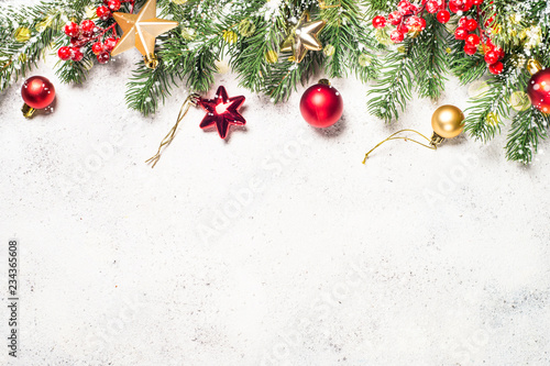 Christmas background with fir tree, present box and decorations 