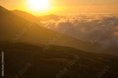Sunset and landscape above thick clouds near Bcharre, Lebanon