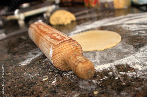 sculpt the dough on the table with flour