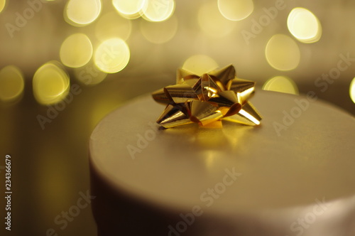 Gold ribbon on gift box