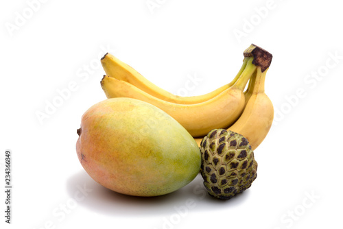 sugar apple, mango and banana isolated on the white photo