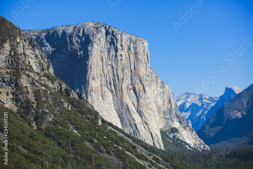Beautiful summer view of Yosemite Valley , with El Capitan mountain, Half Dome mountain, Bridalveil waterfall, seen from Tunnel View vista point, Yosemite National Park, California, USA