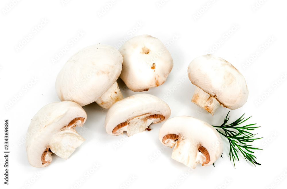 Fototapeta premium white mushrooms and greens on a white background