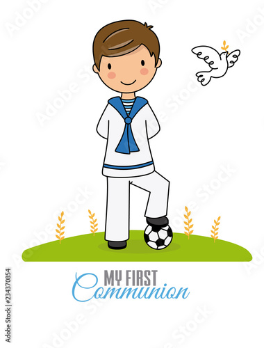 my first communion boy. Boy in communion costume and soccer ball