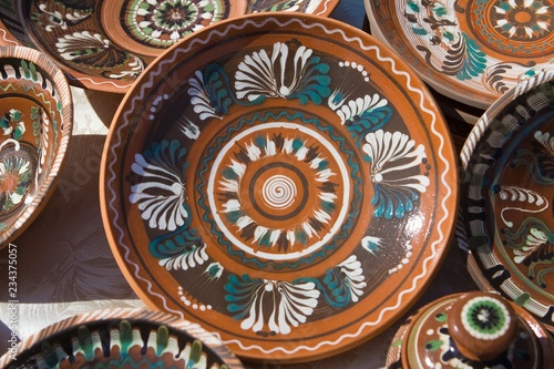 traditional Ukrainian ceramic clay plates  handmade and handpainted  bright floral and abstract pattern
