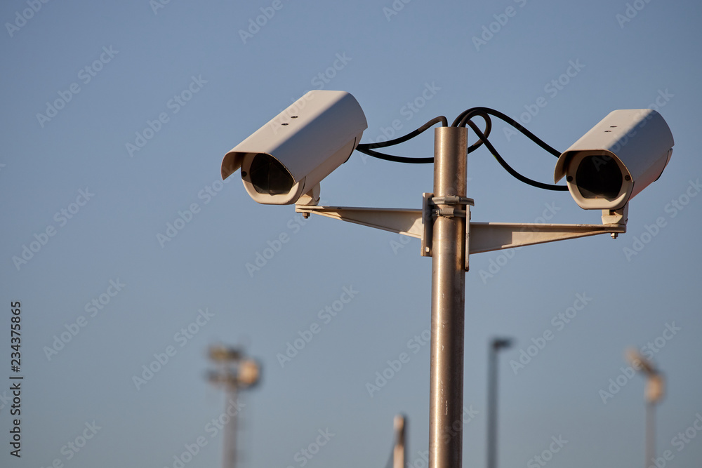 Surveillance camera in brick wall Surveillance camera in brick wall