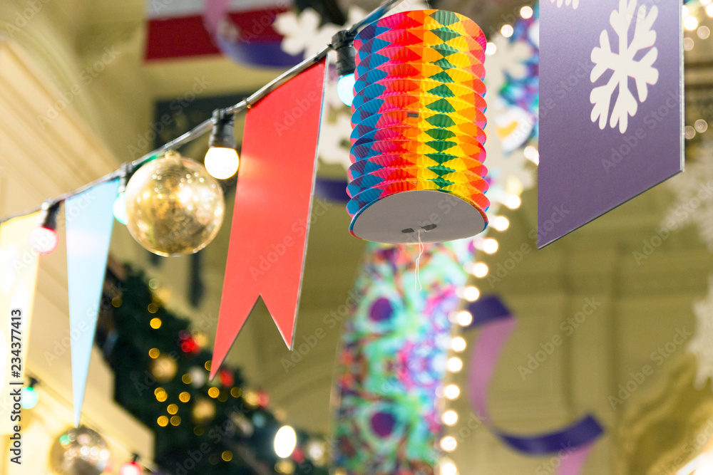 Сhristmas decorations: garland, serpentine, christmas toys, flags, snowflakes, lanterns