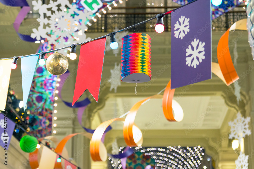 Fototapeta premium Сhristmas decorations: garland, serpentine, christmas toys, flags, snowflakes, lanterns