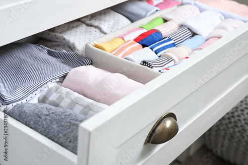 Wardrobe drawer with many child socks, closeup Fototapet