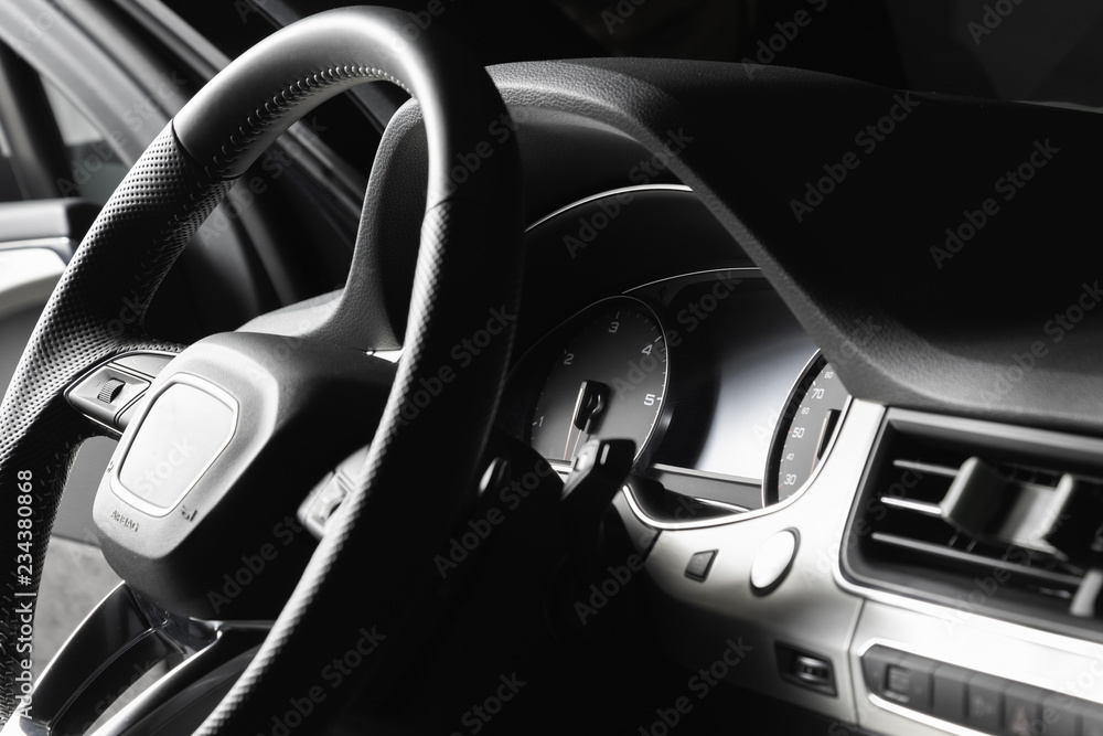 Dashboard, multifunctional steering wheel and start engine buttom in luxury suv