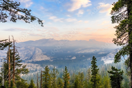 Sunrise landscape in Yosemite National Park; low visibility due to the smoke from the Ferguson Fire present in the air; California photo