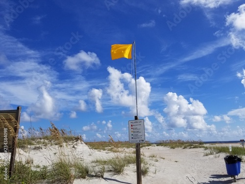 sandy beach with clouds