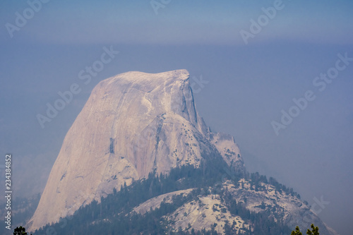 View towards Half Dome on a day with low visibility due to the smoke coming from the Ferguson Fire, Yosemite National Park, California photo