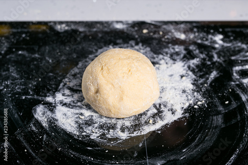 Dough on a black surface