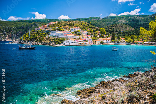 Beautiful blue bay in Assos village located on Kefalonia. Summer tourism vacation trip around Greece photo