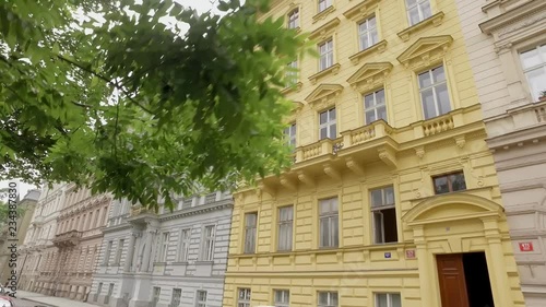 facades of multi colored traditional classic buildings in european city