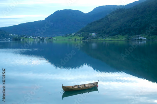 wooden boat on the lake
