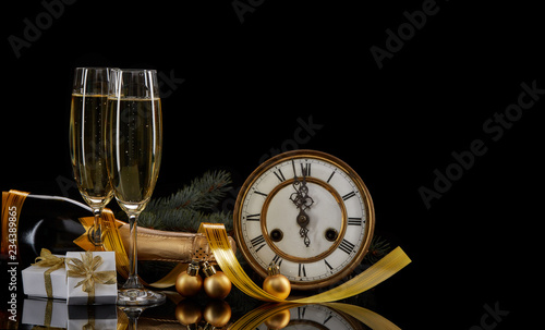 Champagne, clock and Christmas ornaments