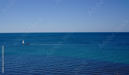 Sailing boat on blue sea © galexia