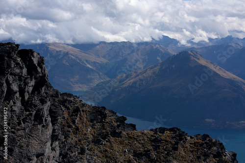 Overlooking a rock at the top of the Remarkables near Queenstown, New Zealand