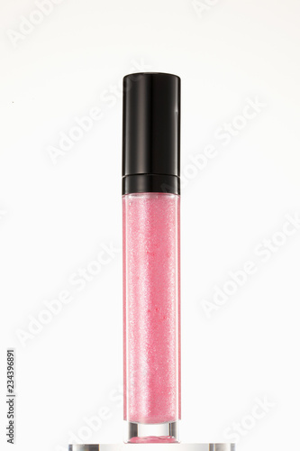 red lipgloss in a container photo