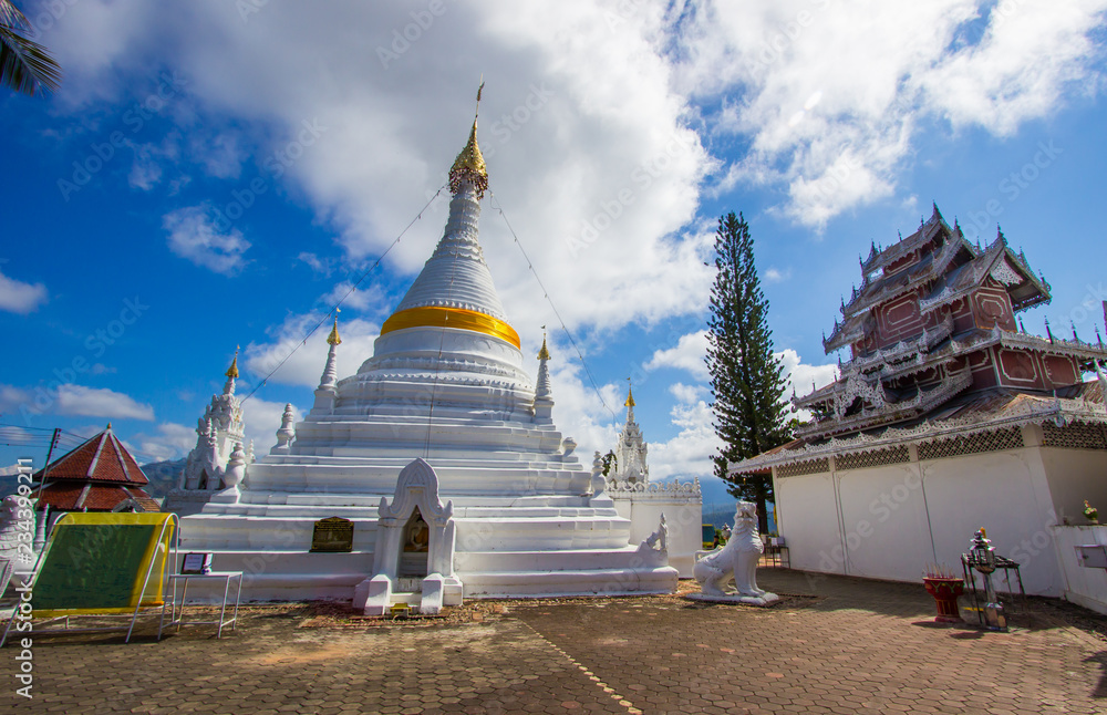Mae Hong Son province,Northern Thailand on November 19,2017: Burmese style white chedis with beautiful sky at Wat Phra That Doi Kong Mu.