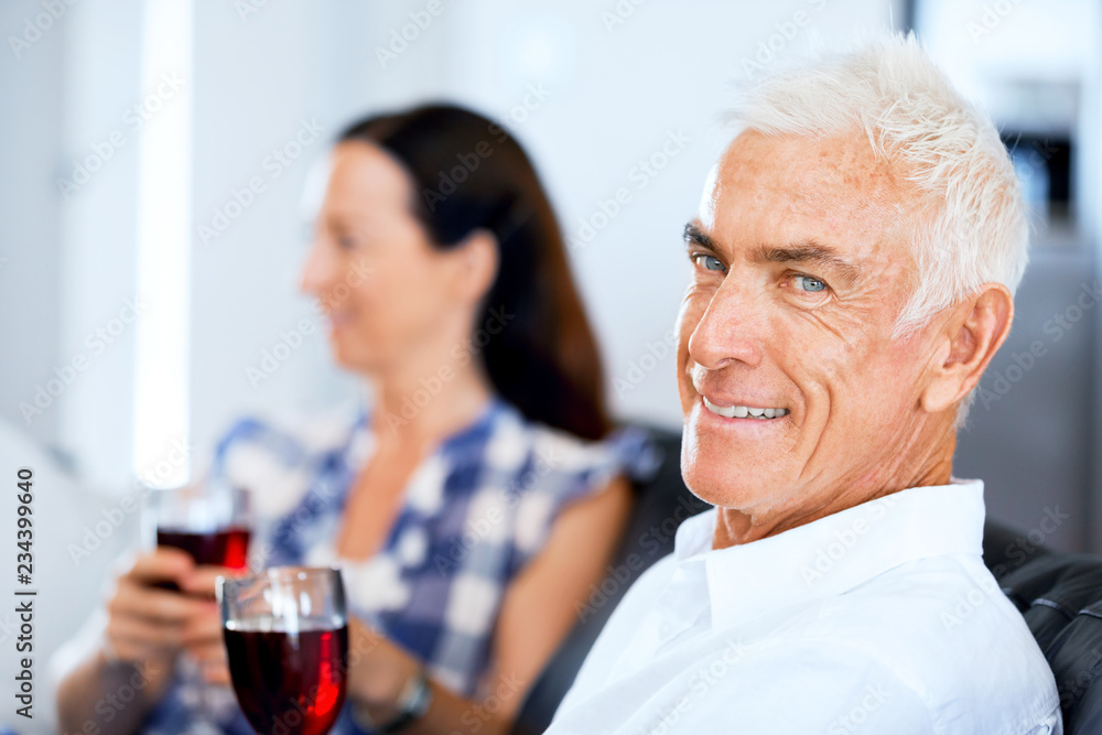 Portrait of a couple having a glass of red wine Portrait of a couple having a glass of red wine