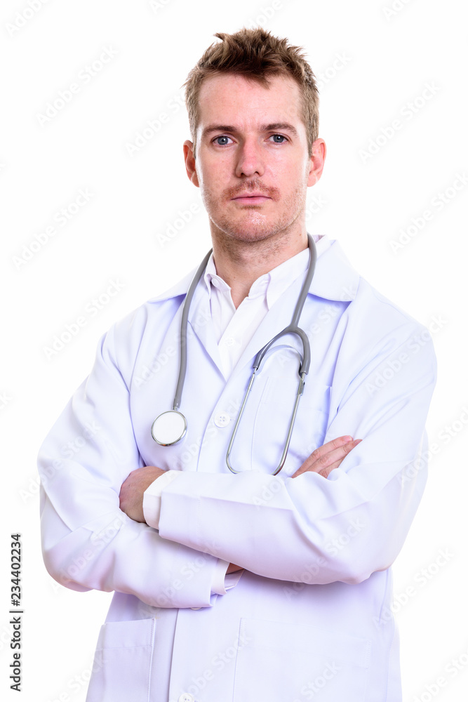 Studio shot of man doctor with arms crossed Studio shot of man doctor with arms crossed