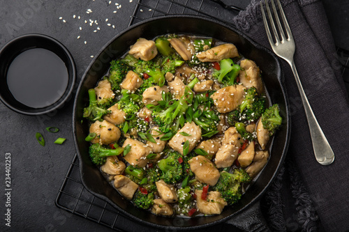 teriyaki chicken and broccoli in cast iron pan