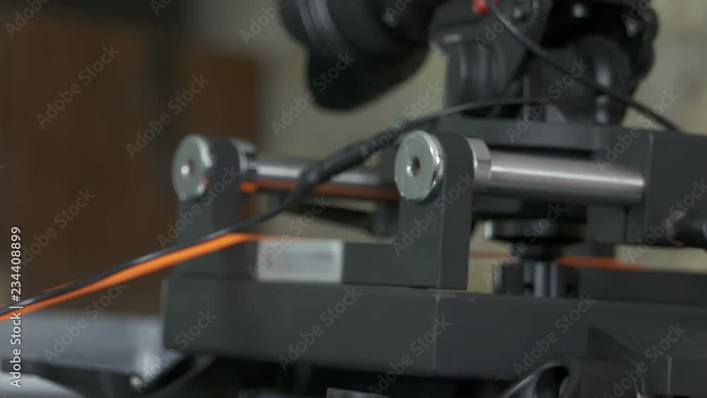 DSLR car suction cup camera mount for shooting on a moving vehicle. Mounting professional video equipment on top of car. DSLR car suction cup camera mount for shooting on a moving vehicle. Mounting professional video equipment on top of car.