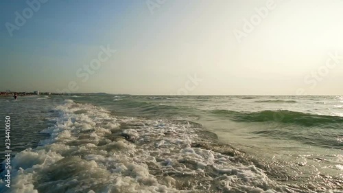 Exotic Beach with waves splashing at sunrist, amazing background photo