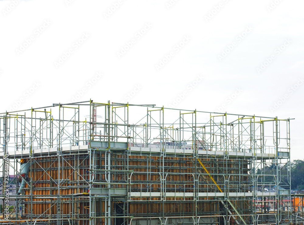 Building construction site with scaffolding