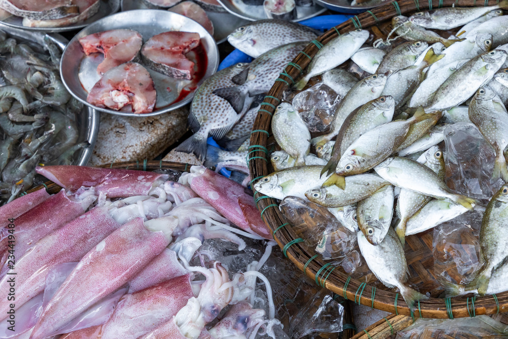 Fresh fish at local traditional market in Hue, Vietnam. Fresh fish at local traditional market in Hue, Vietnam.