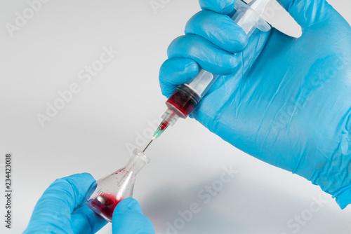 Blood analysis, Doctor with syringe