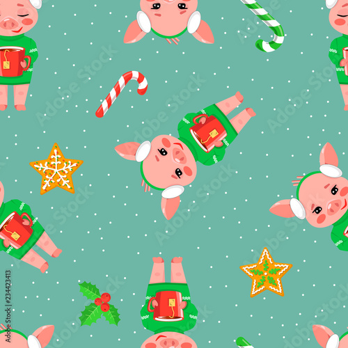 Christmas seamless pattern with a cute little pig with cup of hot tee, gingerbread and candy on blue background. Vector illustration of a cartoon character of the sign of year 2019