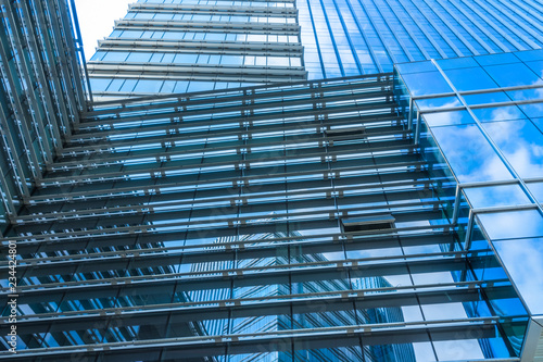 Urban abstract - windowed corner of office building.
