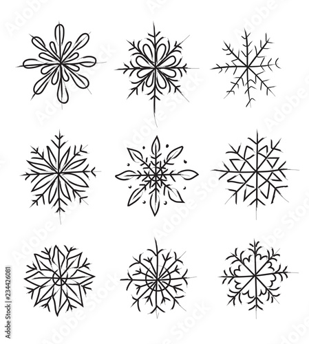 Snowflakes. Set of vector images. Hand drawing by brush.