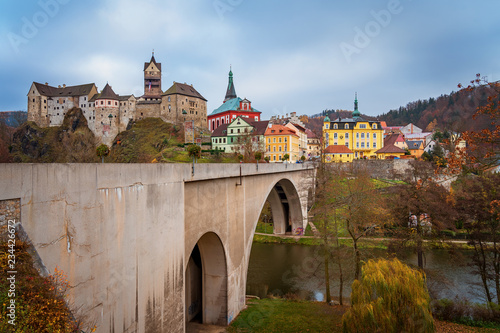 Photography Colorful town and Castle Loket over Eger river in the near of Karlovy Vary, Czec