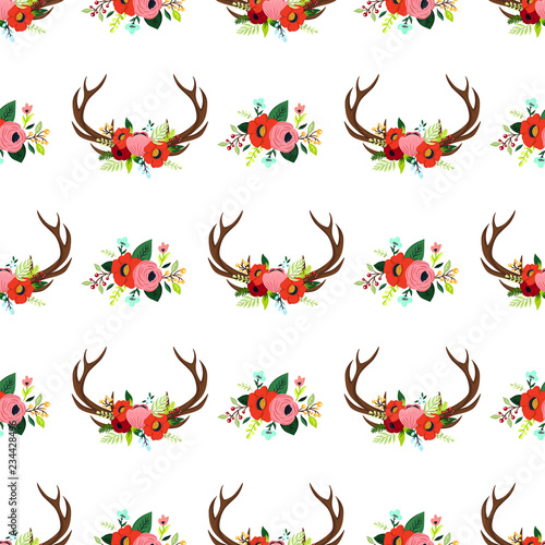 Vector seamless pattern with floral antlers in the bohemian style. Hand drawn deer horns decorated with flowers, leaves and herbs. Boho chic design elements