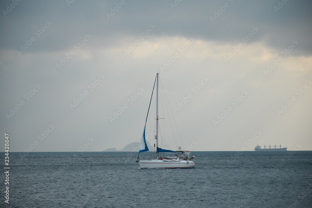 sail inflatable boat on a cloudy day