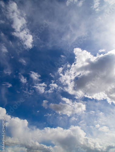 Clouds against blue sky as abstract background © schankz