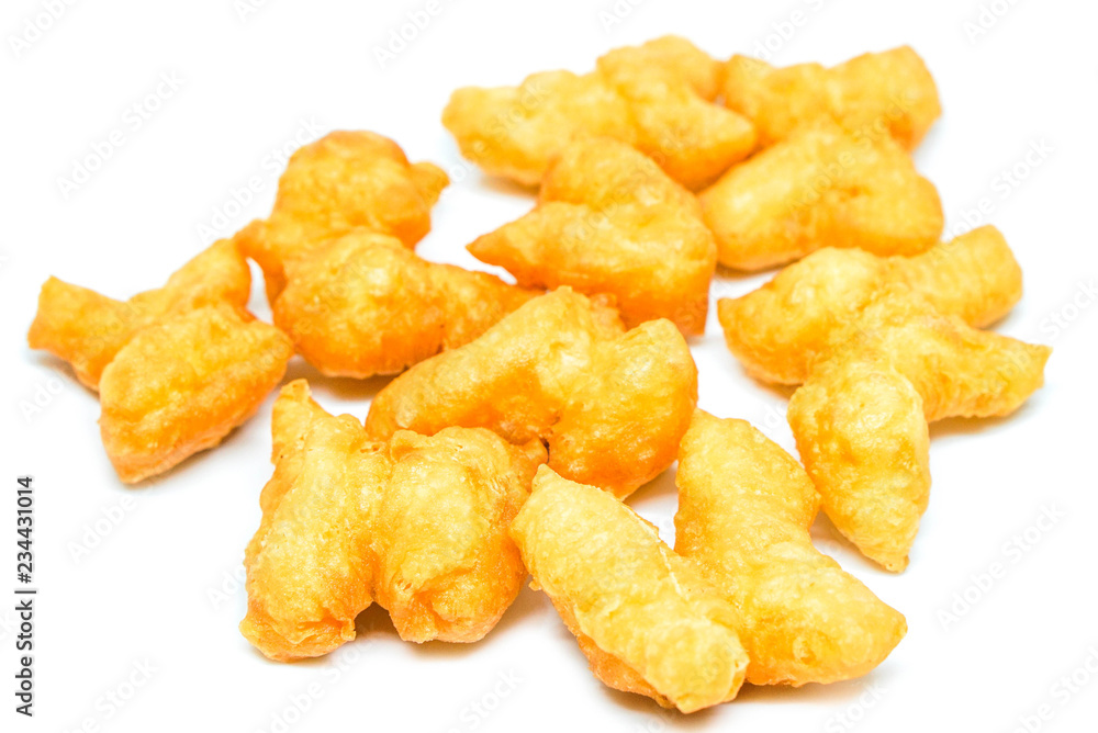 Deep-fried dough sticks or it is called Thai and Chinese “Patongko” isolated on white background Deep-fried dough sticks or it is called Thai and Chinese “Patongko” isolated on white background