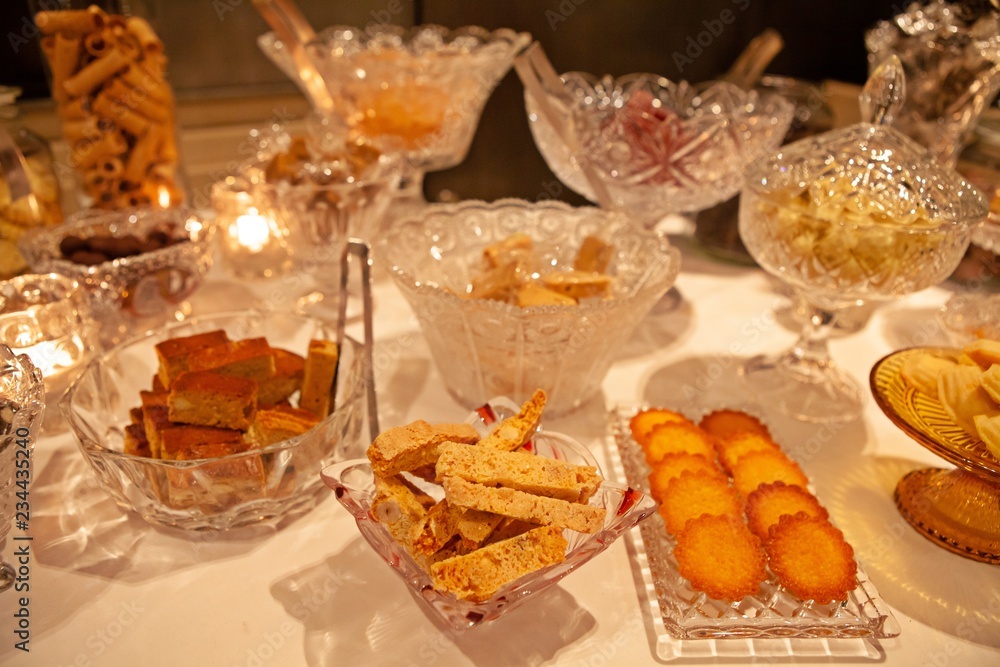 Selection of tasty and delicious cookies and candies made by pastry chef. Sweets heaven. Good for Petit four, afternoon tea or high tea party. Ready for Christmas and Happy New Year celebration.