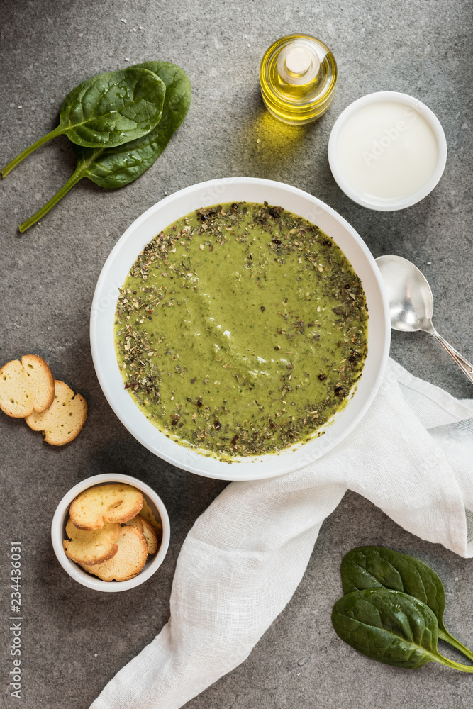 Top view of homemade creamy spinach soup with croutons Top view of homemade creamy spinach soup with croutons